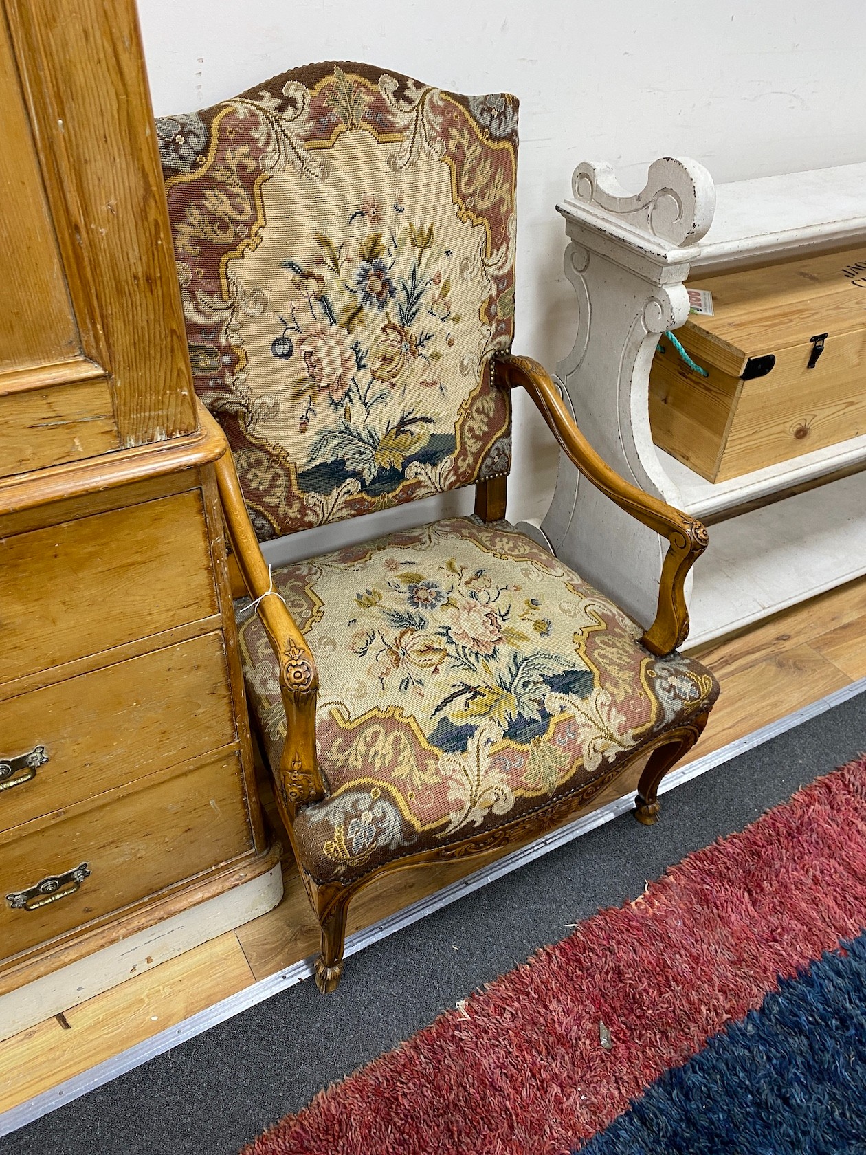 A pair of Louis XV style needlepoint armchairs, width 65cm, depth 60cm, height 112cm